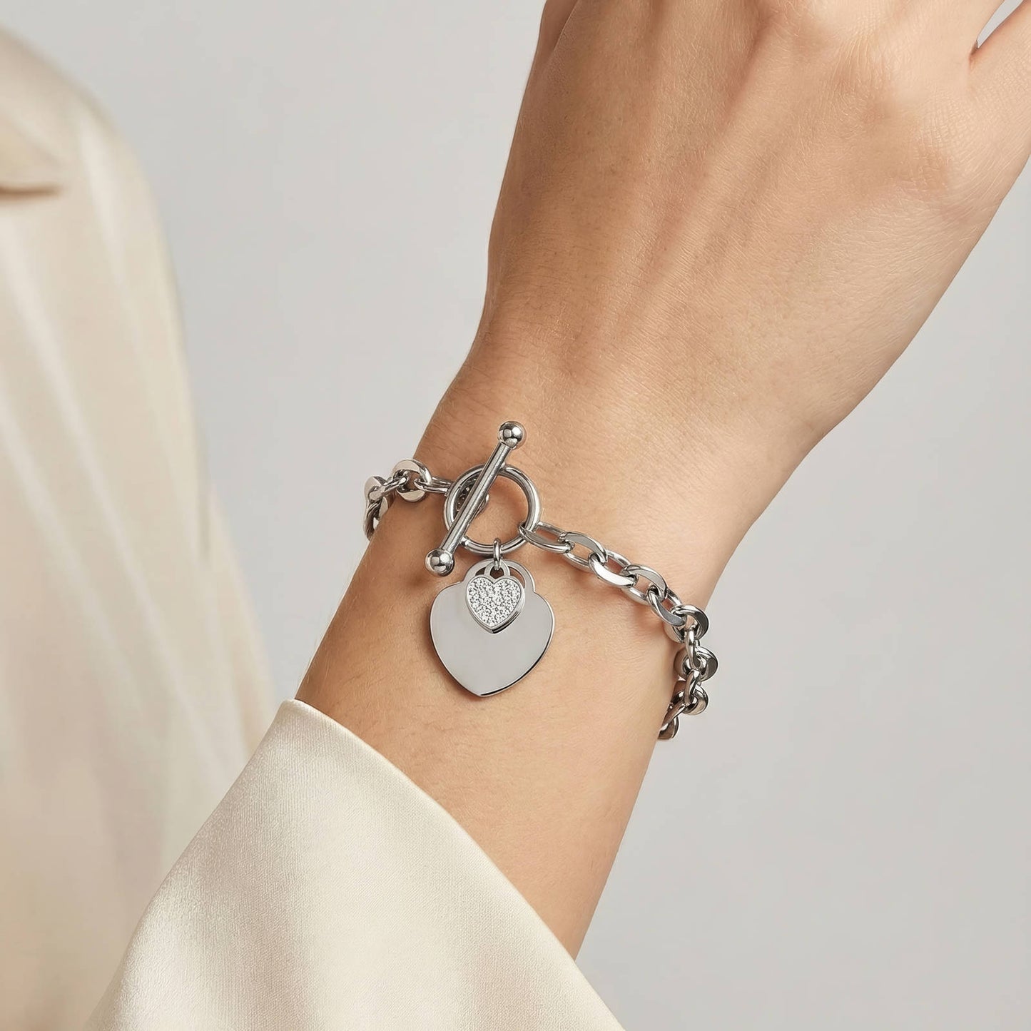 Stijlvolle hart armband met cubic zirkonia in roestvrij staal (19.5cm). Waterproof en hypoallergeen. DAUW JUWELEN.